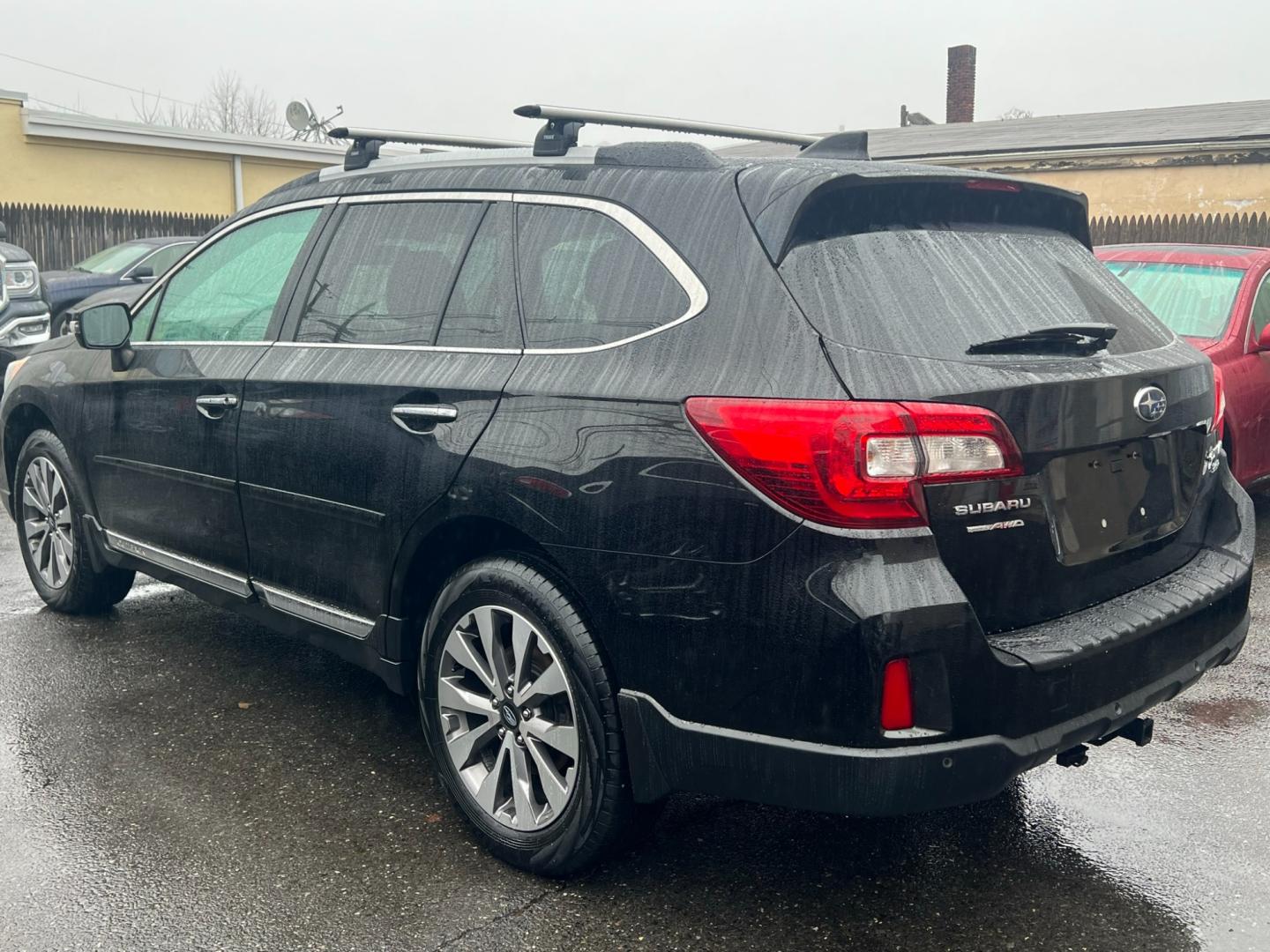 2017 BLACK /Brown Leather Subaru Outback 2.5i Touring (4S4BSETCXH3) with an 2.5L H4 DOHC 16V engine, 6A transmission, located at 1018 Brunswick Ave, Trenton, NJ, 08638, (609) 989-0900, 40.240086, -74.748085 - Photo#5